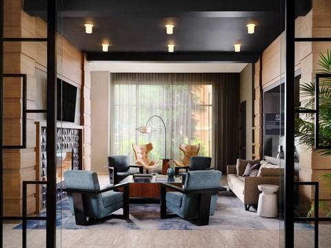 a living room filled with furniture and a large window