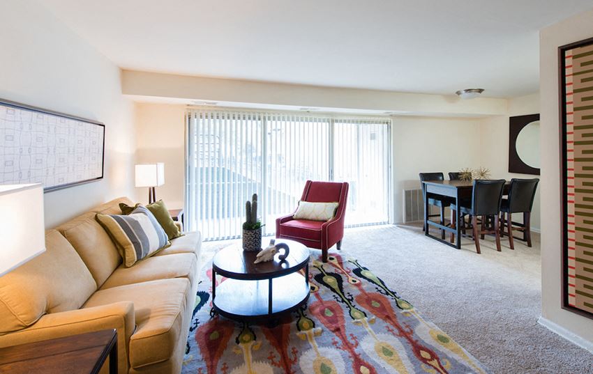a living room with a couch and a table