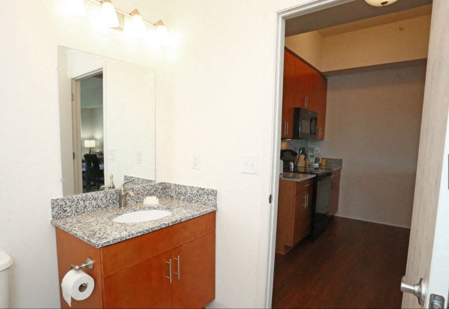 a bathroom with a sink and a mirror