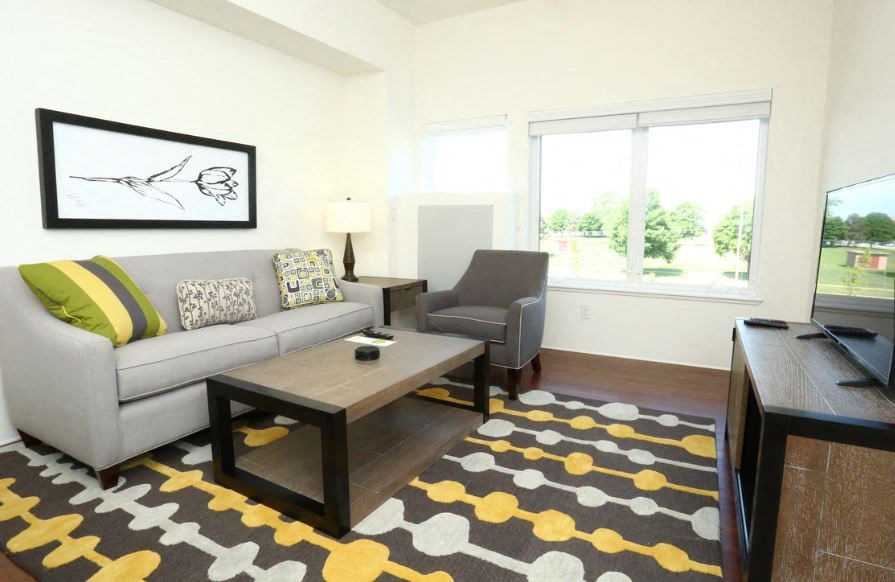 a living room with a couch and a coffee table