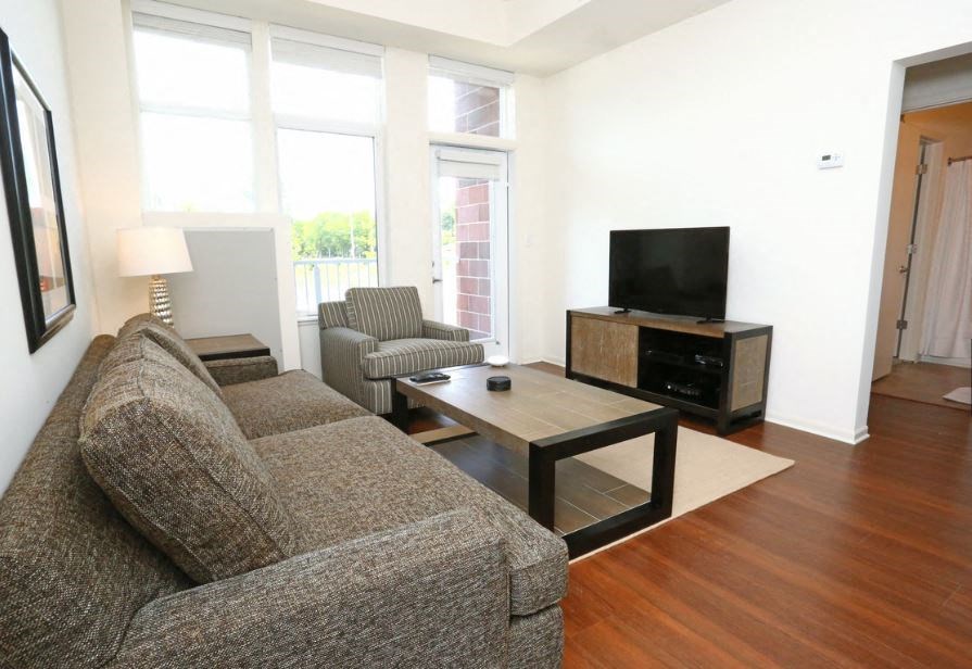 a living room with a couch and a television