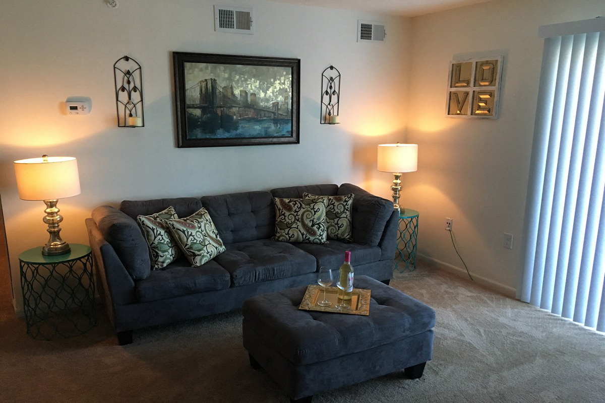 a living room with a couch and a coffee table