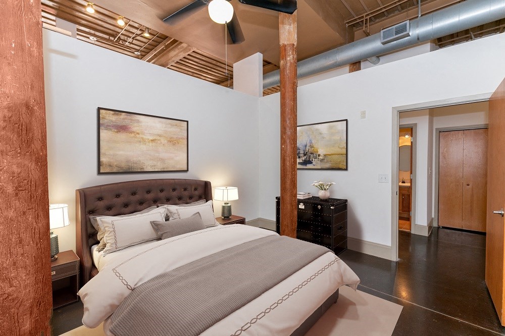 a bedroom with a bed in a loft