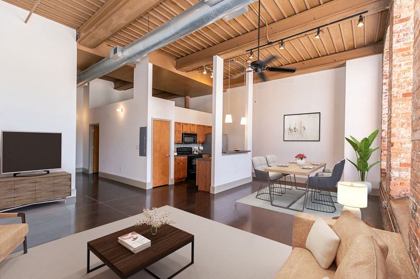 a living room with a couch and a table