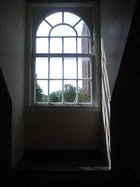 a window in a dark room with a