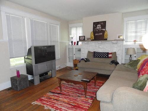 a living room with a couch and a television