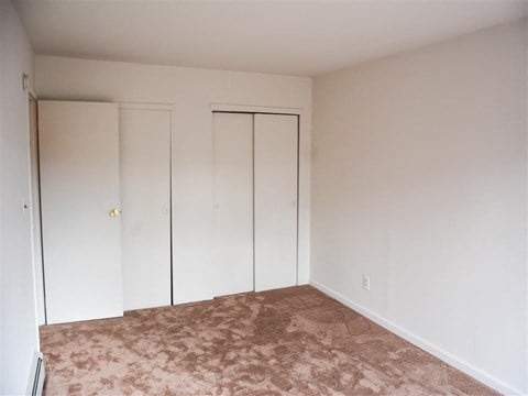 Carpeted Bedroom at Brookwood at Holbrook, Holbrook, New York