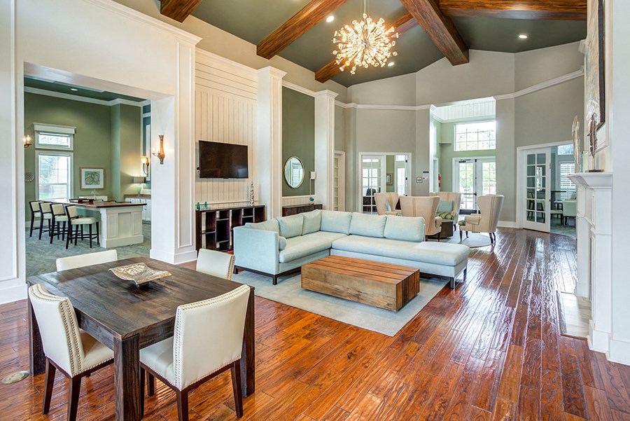 a living room with a couch and a table