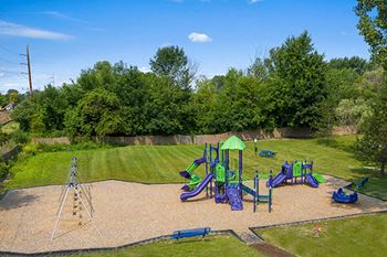 Outdoor playground at Fountain Pointe apartments
