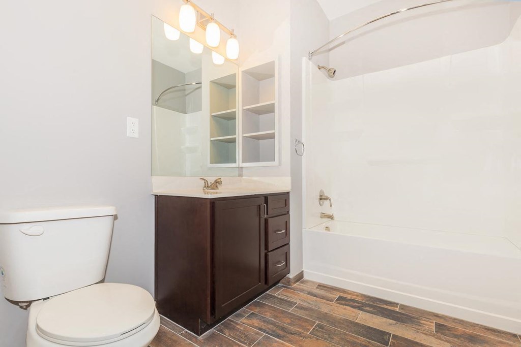 a bathroom with a toilet and a sink