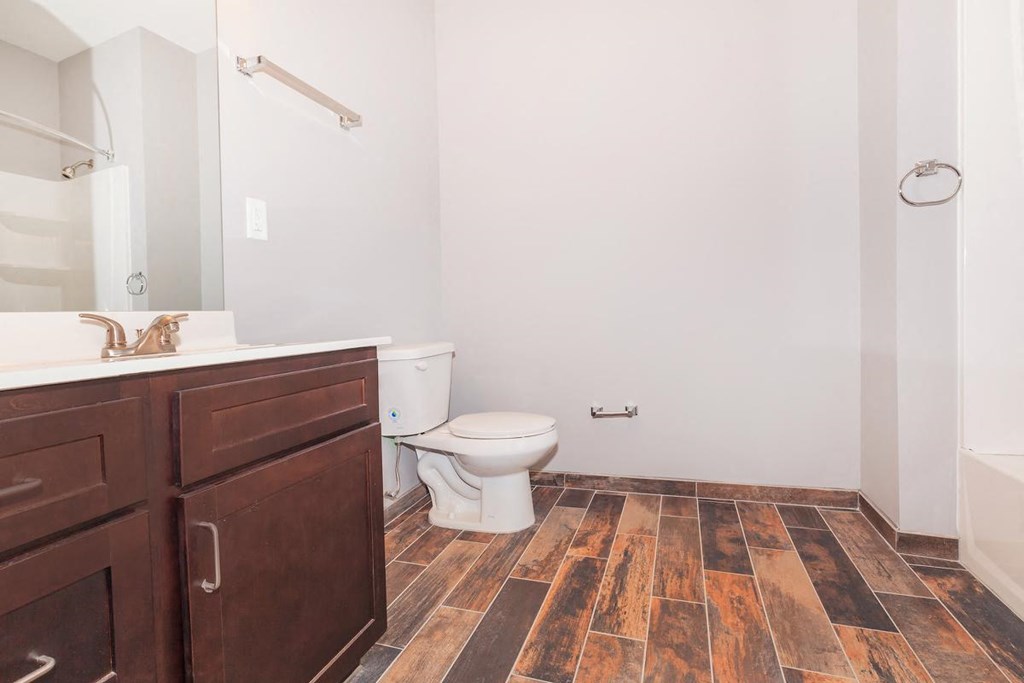 a bathroom with a toilet and a sink
