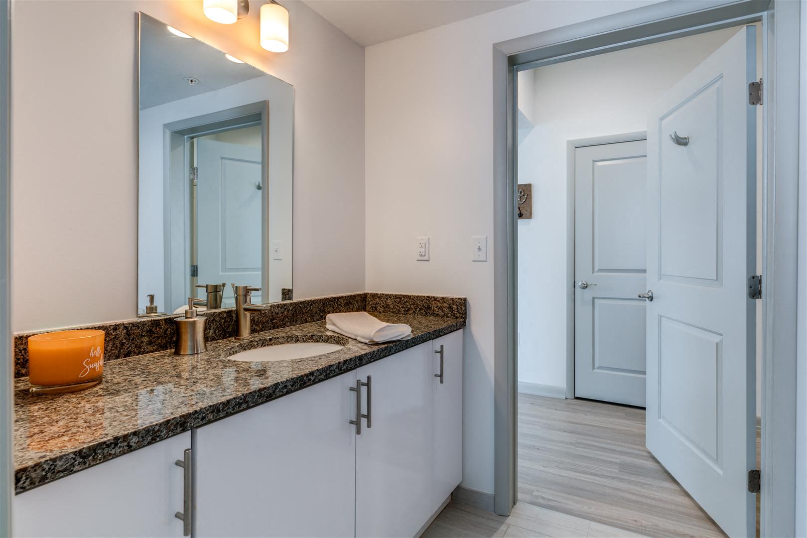 a bathroom with a sink and a mirror