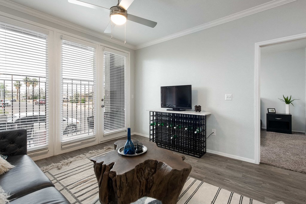 a living room with a couch and a tv