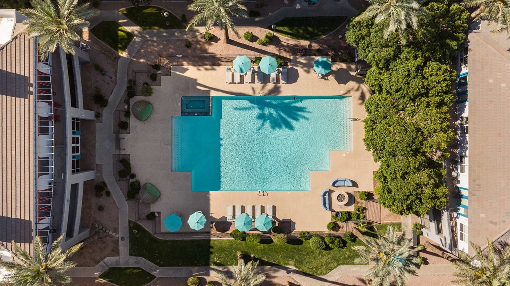 a birds eye view of the pool at the resort at longboat key club