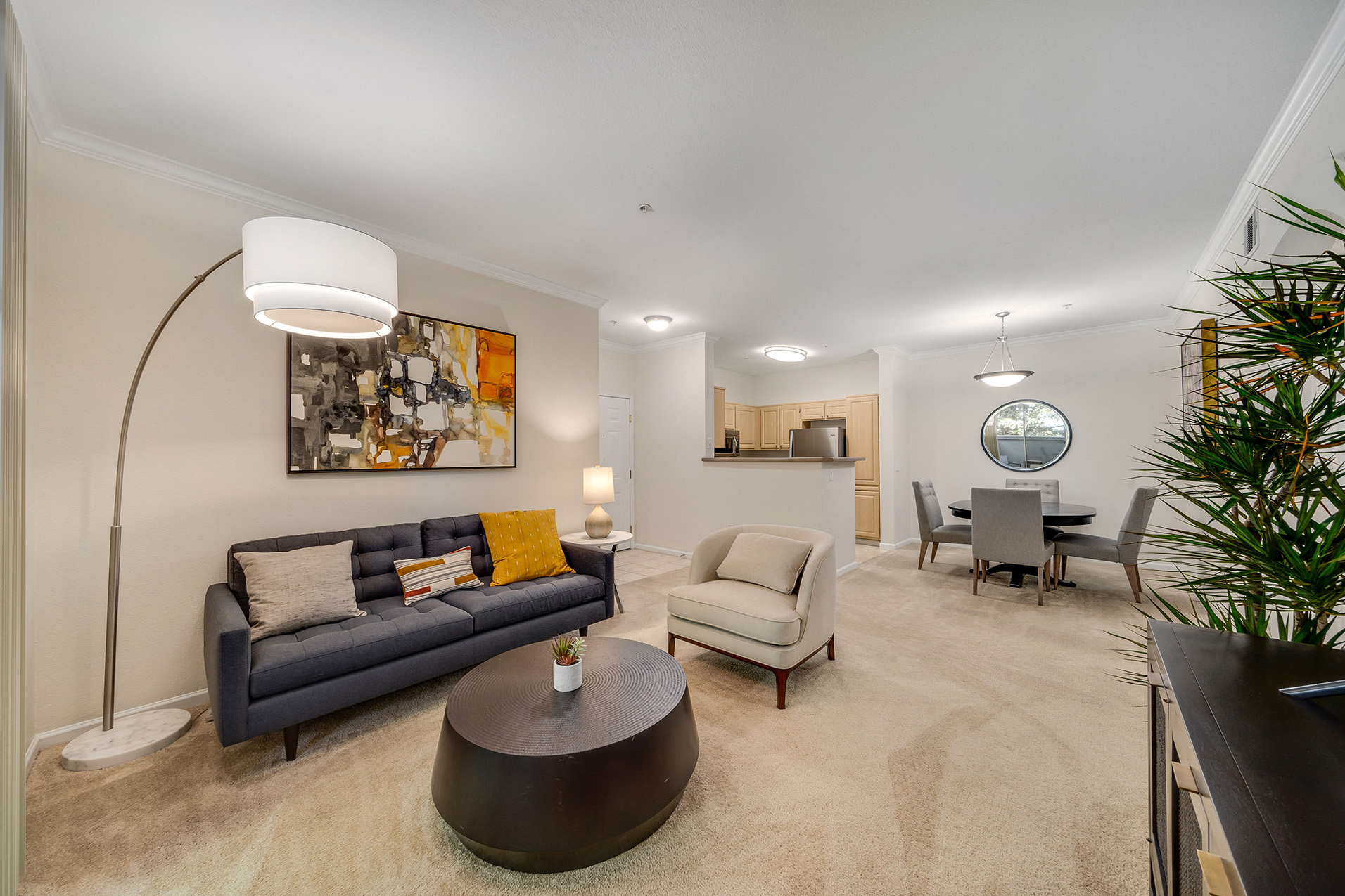 a living room with a couch and a table