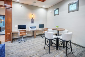 Lodge at Cypresswood Apartments - Business center with Mac and PC computers - Photo Gallery 6