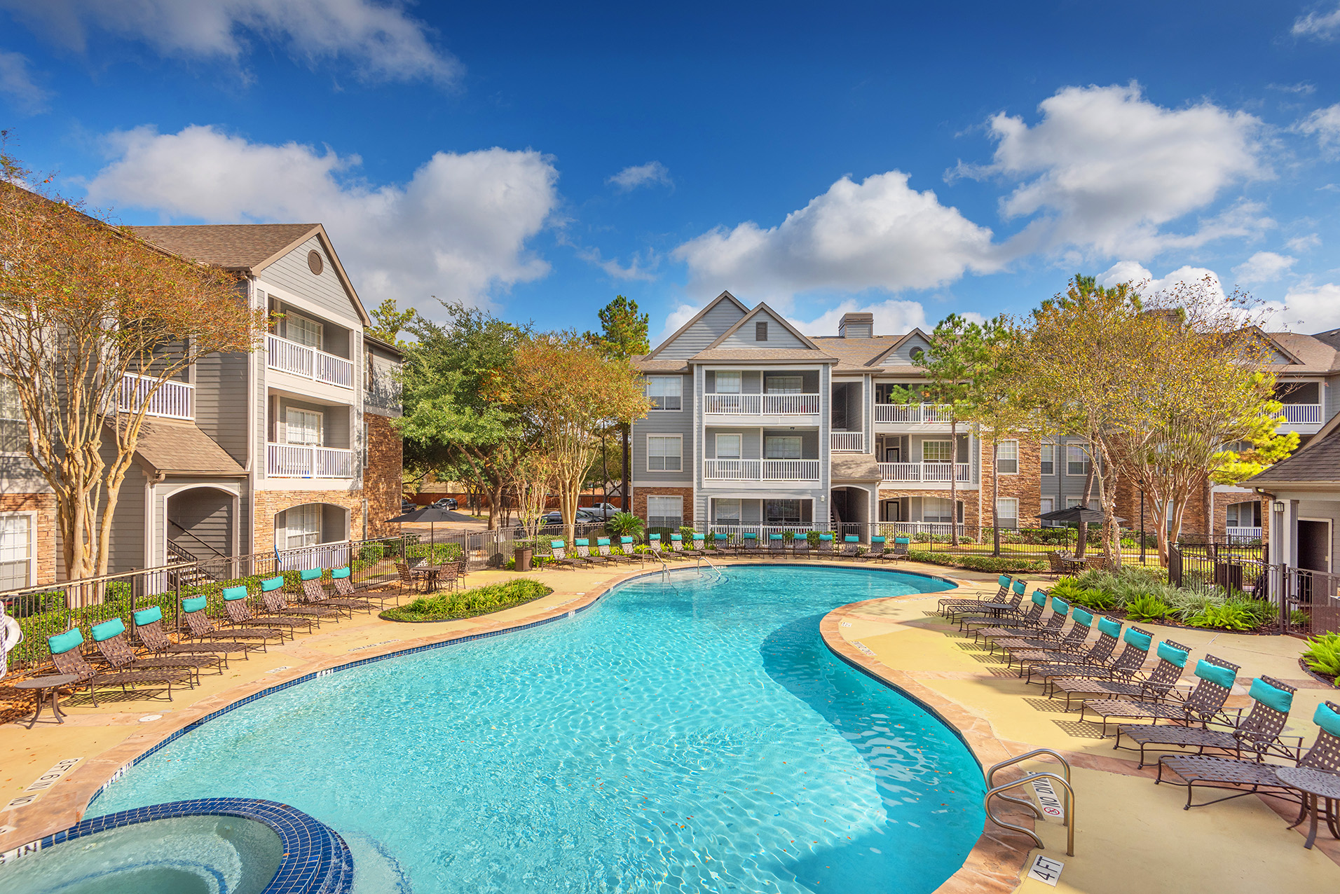 Lodge at Cypresswood Apartments - Resort-style pool