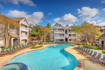 Lodge at Cypresswood Apartments - Resort-style pool - Photo Gallery 12