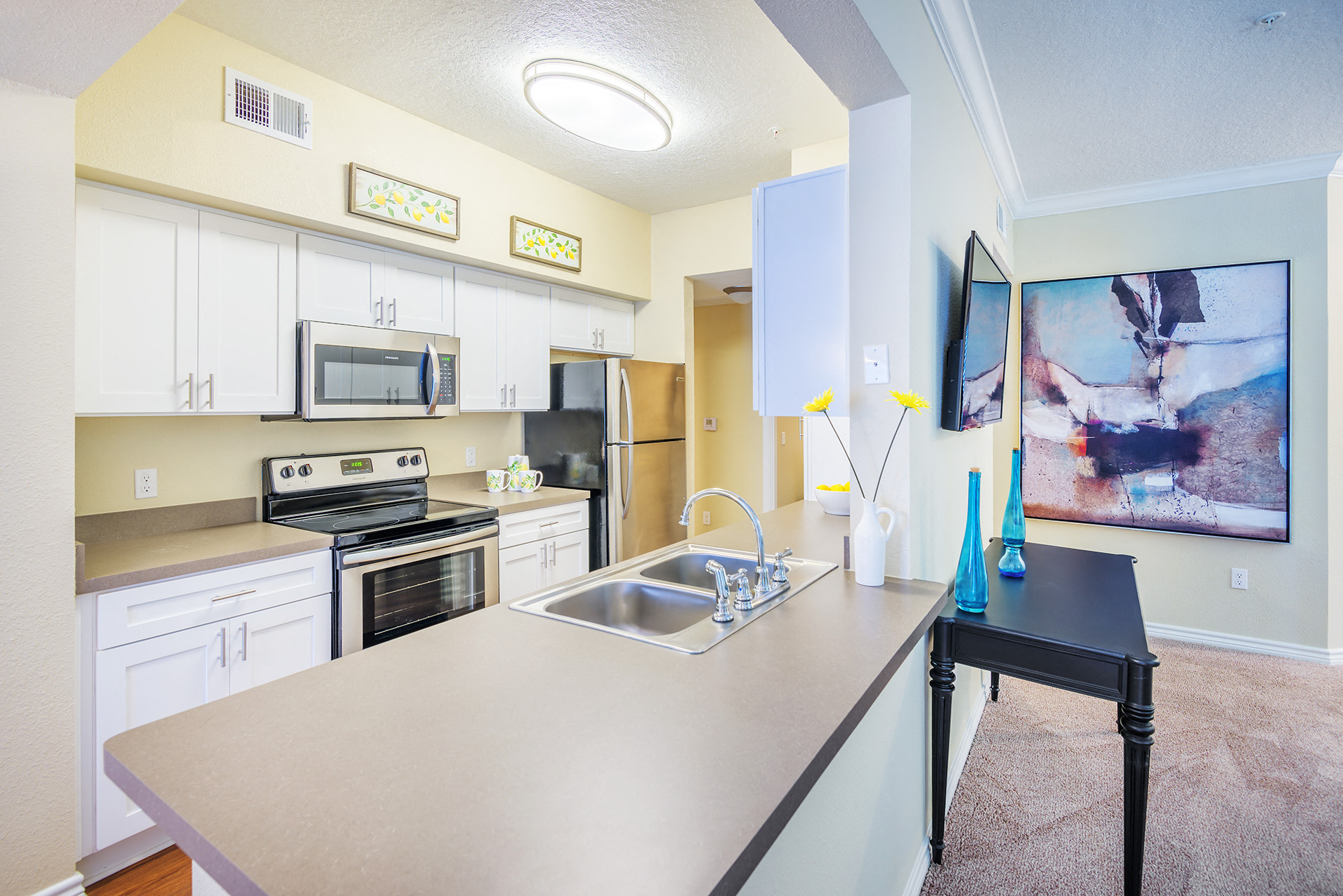 Lodge at Cypresswood Apartments - Interior - Ask about our upgraded kitchen with stainless steel appliances