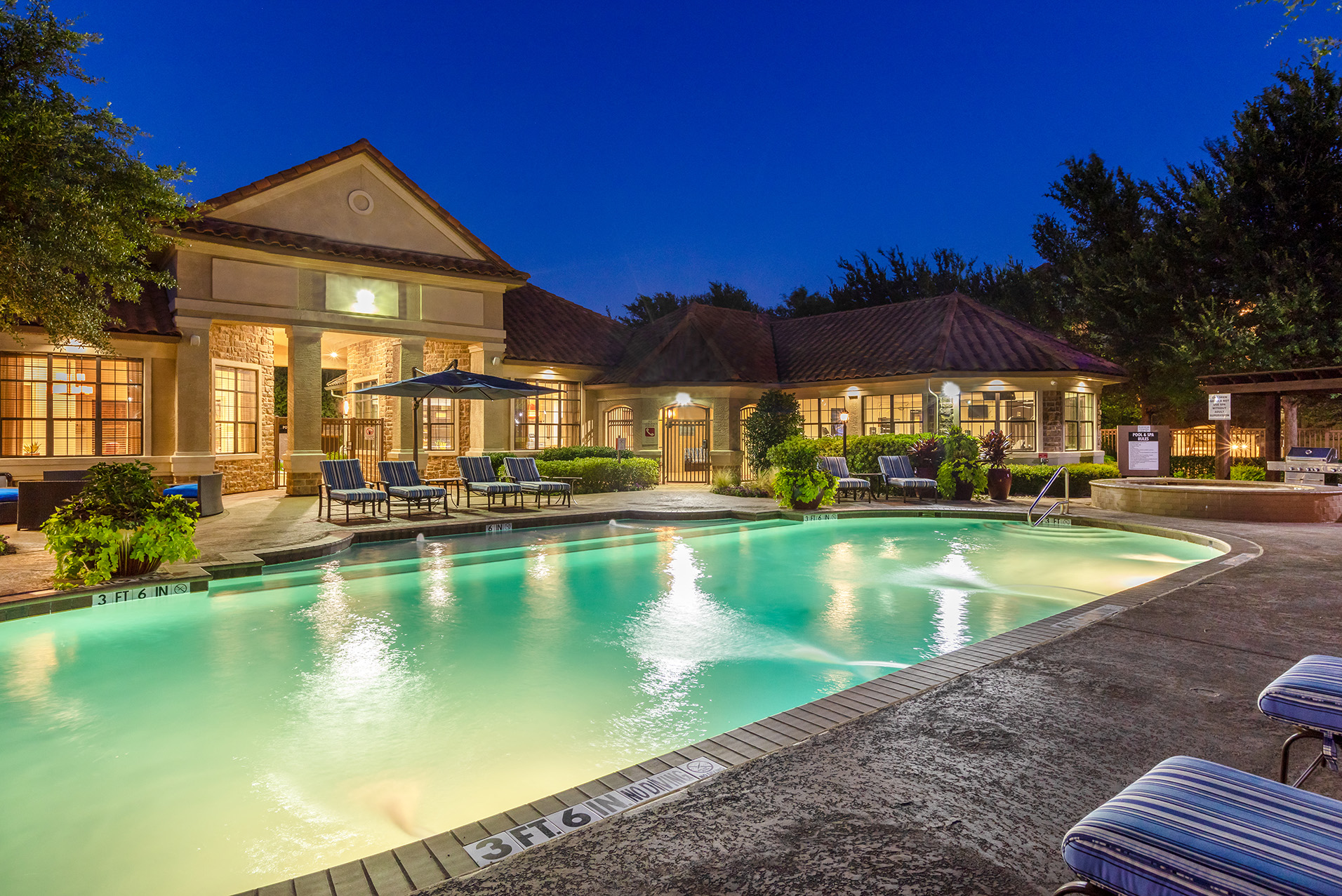 DeLayne at Twin Creeks - Pool at twilight exterior