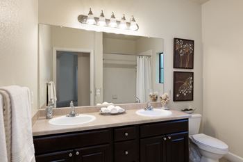 DeLayne at Twin Creeks vanity areas with dual sinks in select units
