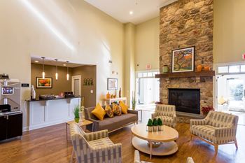 Avenel at Montgomery Square - Resident clubhouse with fireplace and kitchen