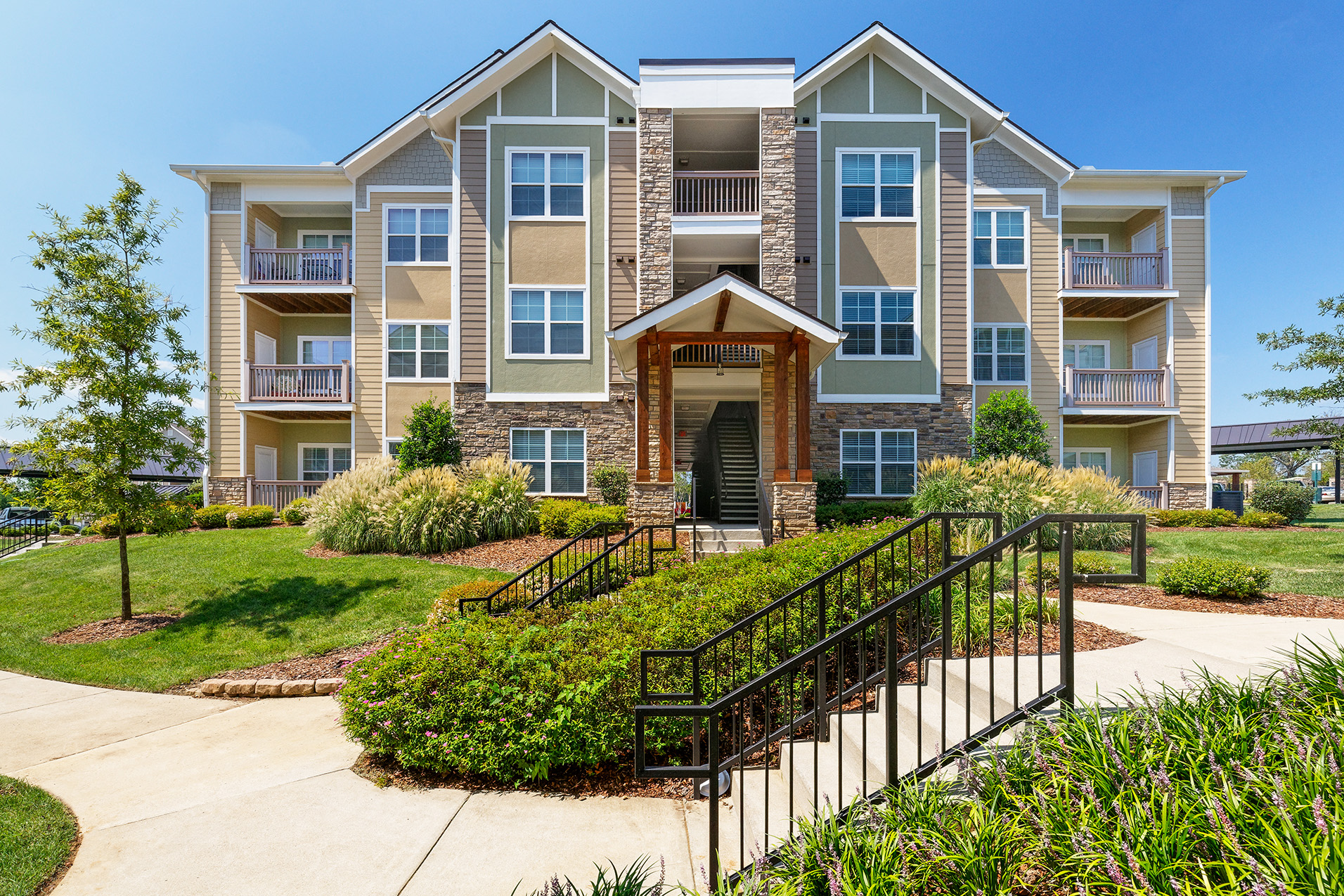 Glenbrook Apartments - Building exterior and pathway with stairs