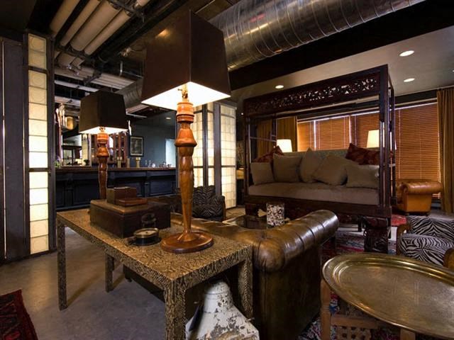 a living room with a couch and a table