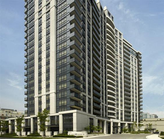 A tall building with a lot of windows and balconies.