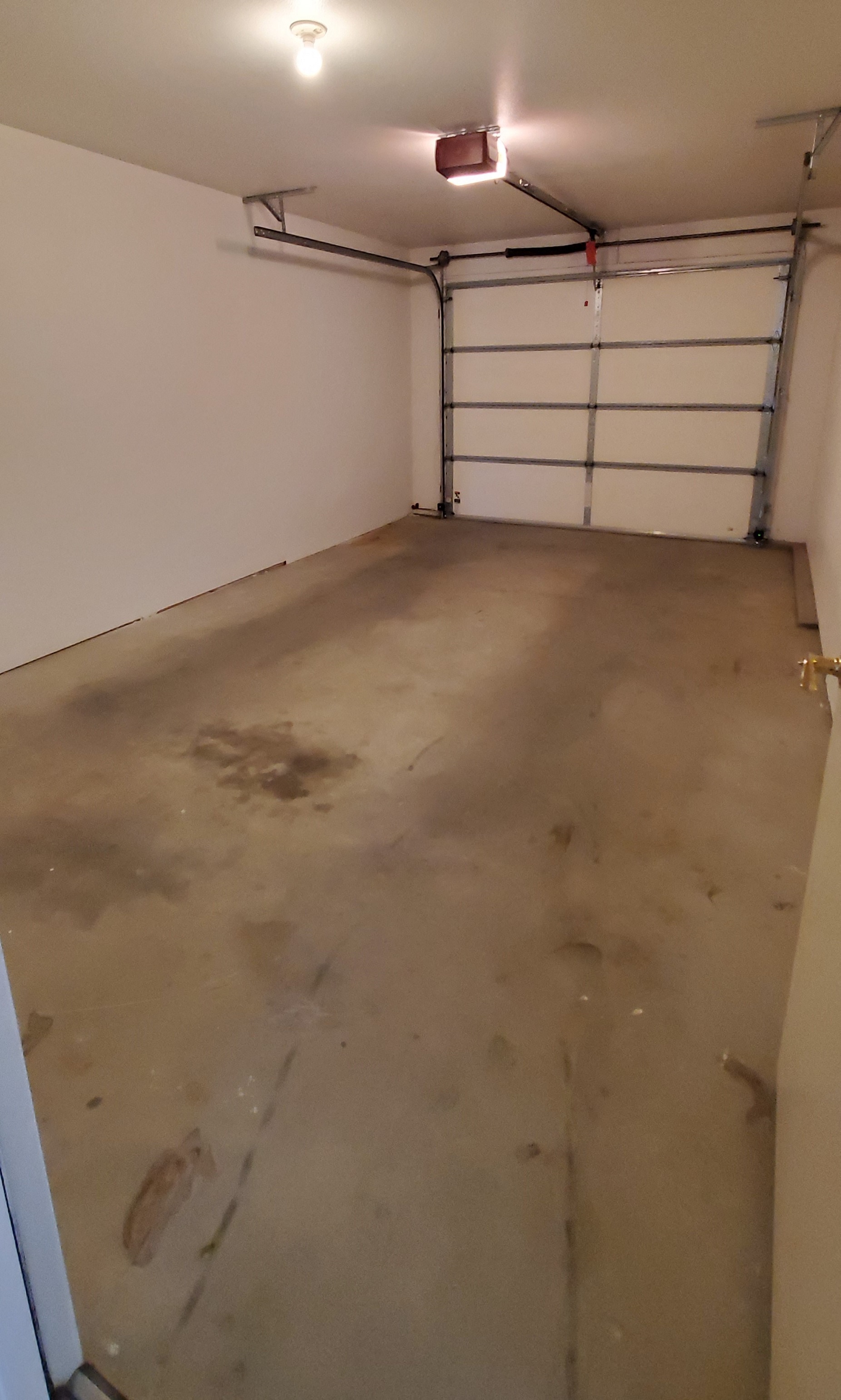 the garage floor has been cleaned and is ready to be painted