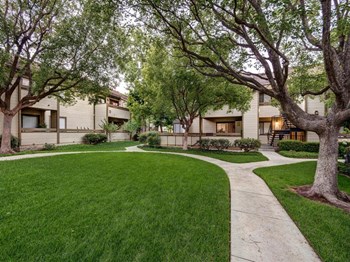 Grass area with sidewalk to apts 91325 pet friendly apartments at grand on lindley