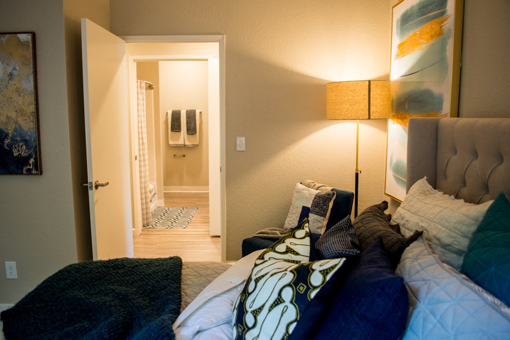 Apartments for Rent in Sacramento CA - Waterford Cove - Bedroom with Bed and Attached Bathroom
