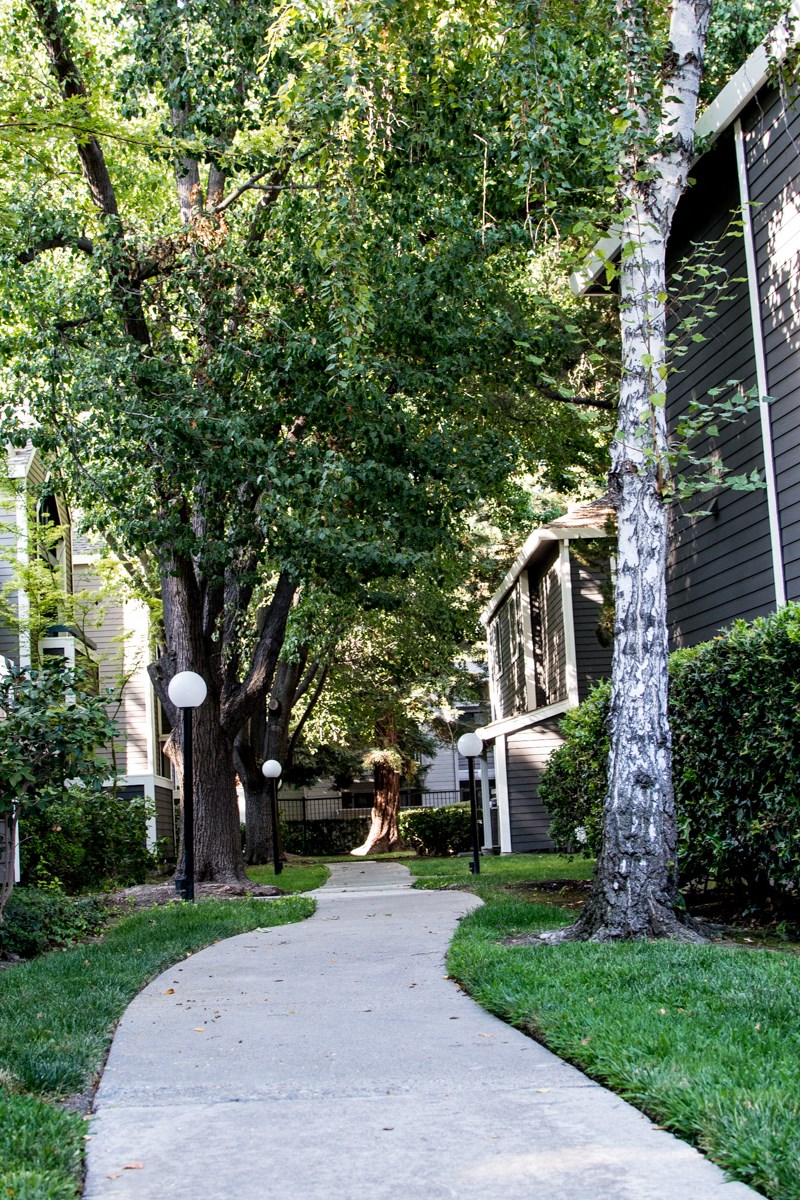 Walkway to buildings l Waterford Cove Apartments in Sacramento CA