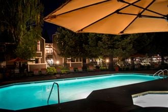 Apartments for Rent in Sacramento, CA-Waterford-Cove-Pool with Lounge Seating and Umbrellas