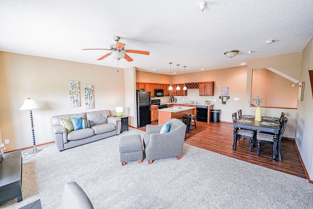 a living room with a couch and a table