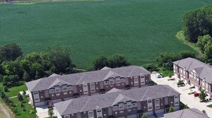 an aerial view of a group of houses in a neighborhood