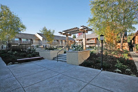 Outside seating near steps  | The Meridian Apartment Homes in Walnut Creek, CA