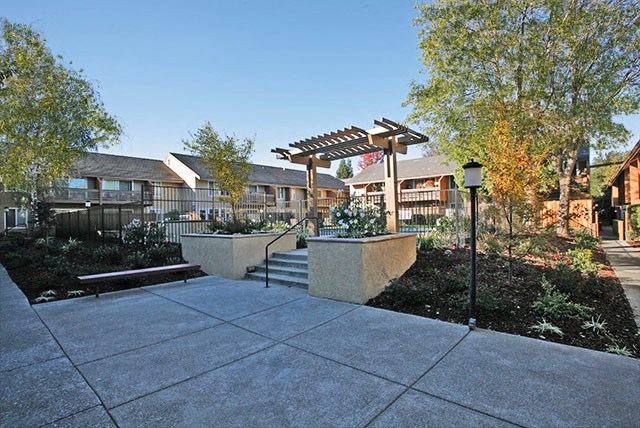 Outside seating near steps | The Meridian Apartment Homes in Walnut Creek, CA