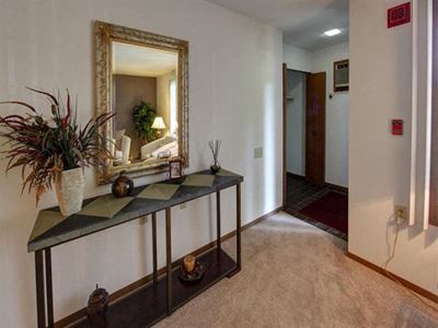 Mirror And A Lamp at Stonewood Village Apartments, Madison, WI