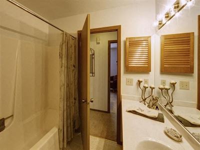 Renovated Bathrooms With Quartz Counters at Stonewood Village Apartments, Madison, Wisconsin