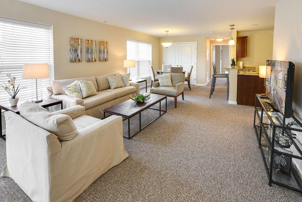 a living room with a couch and a table