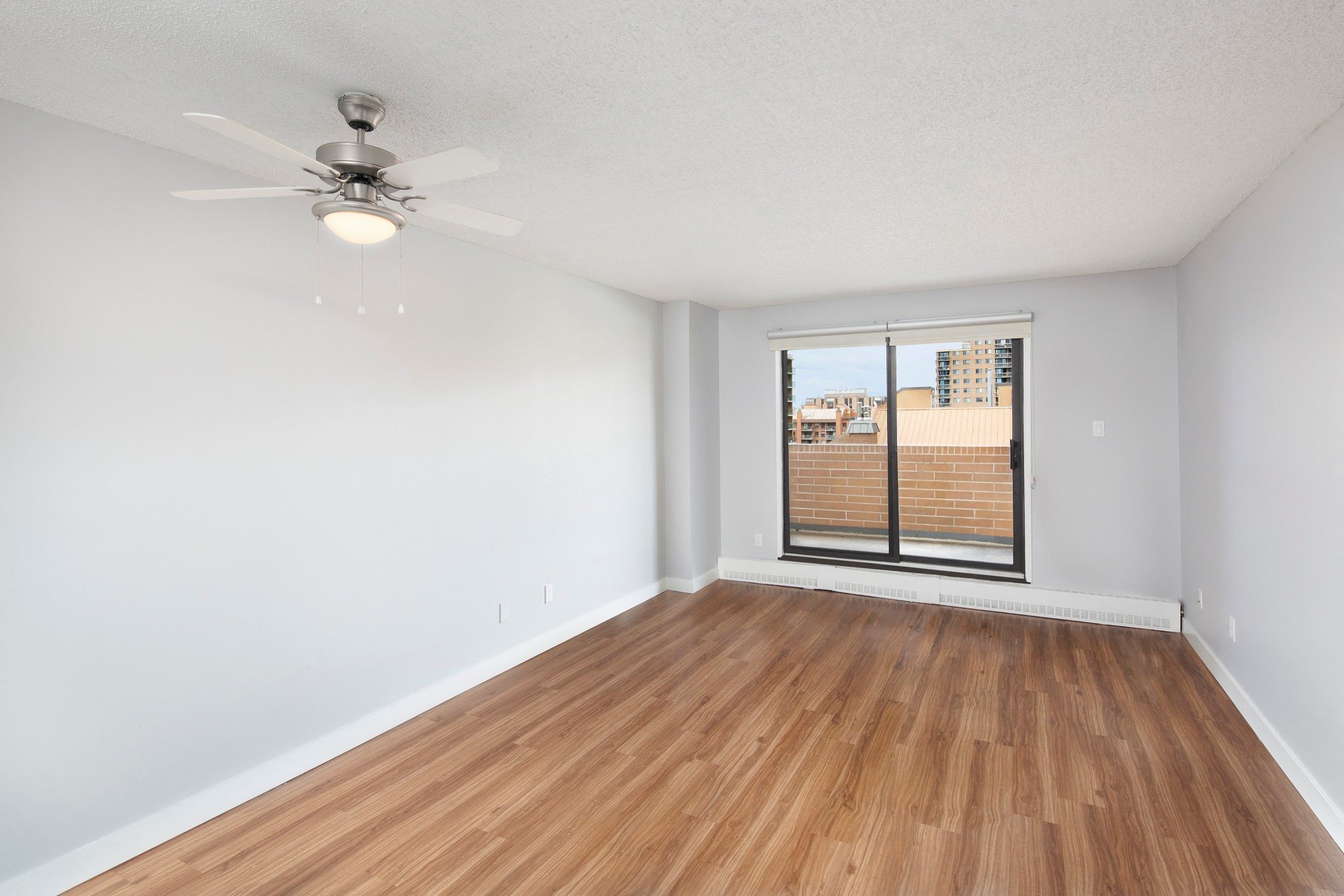 empty living room with balcony door