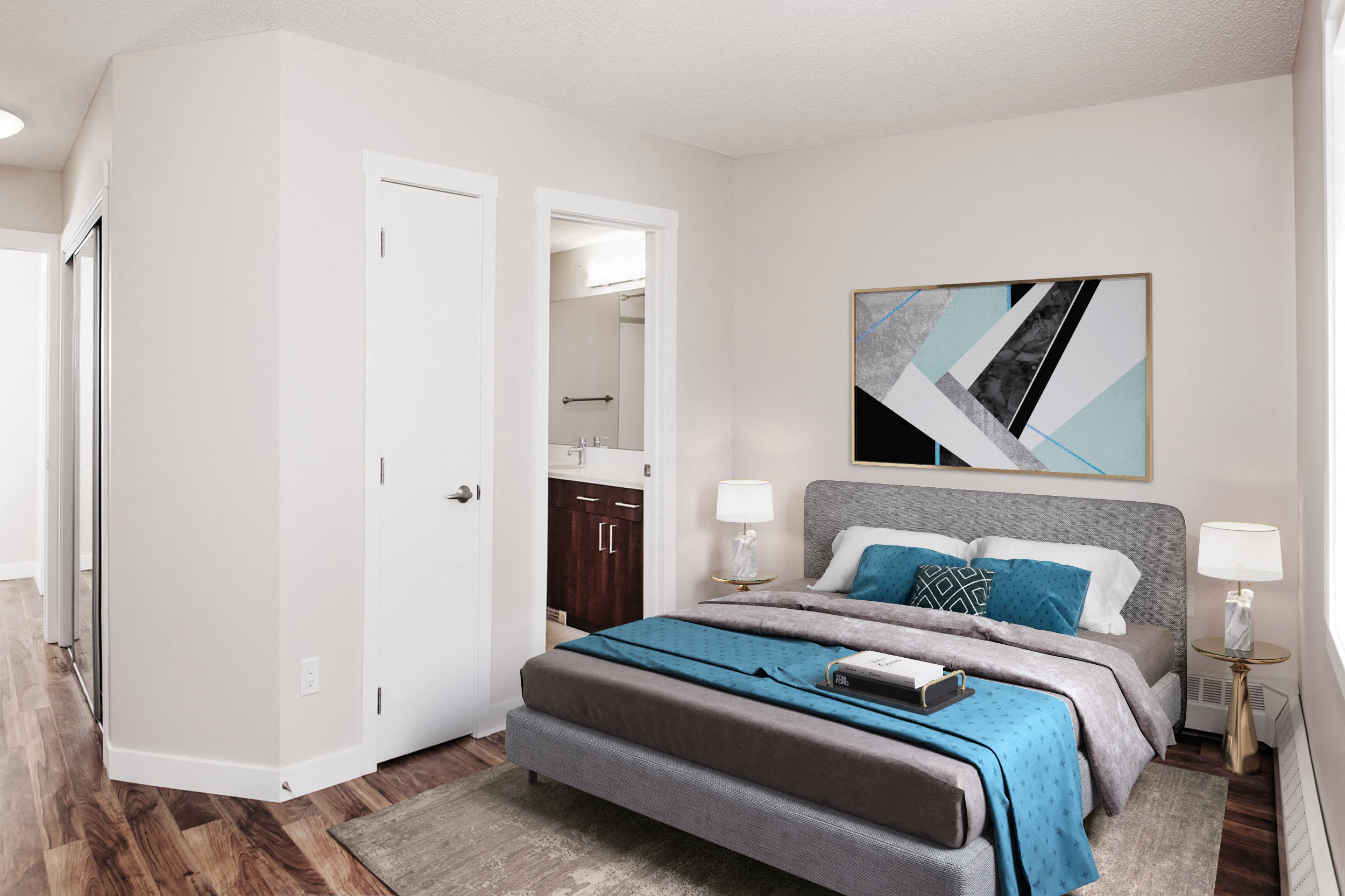 Bedroom with a bed, area rug and a view to the ensuite bathroom