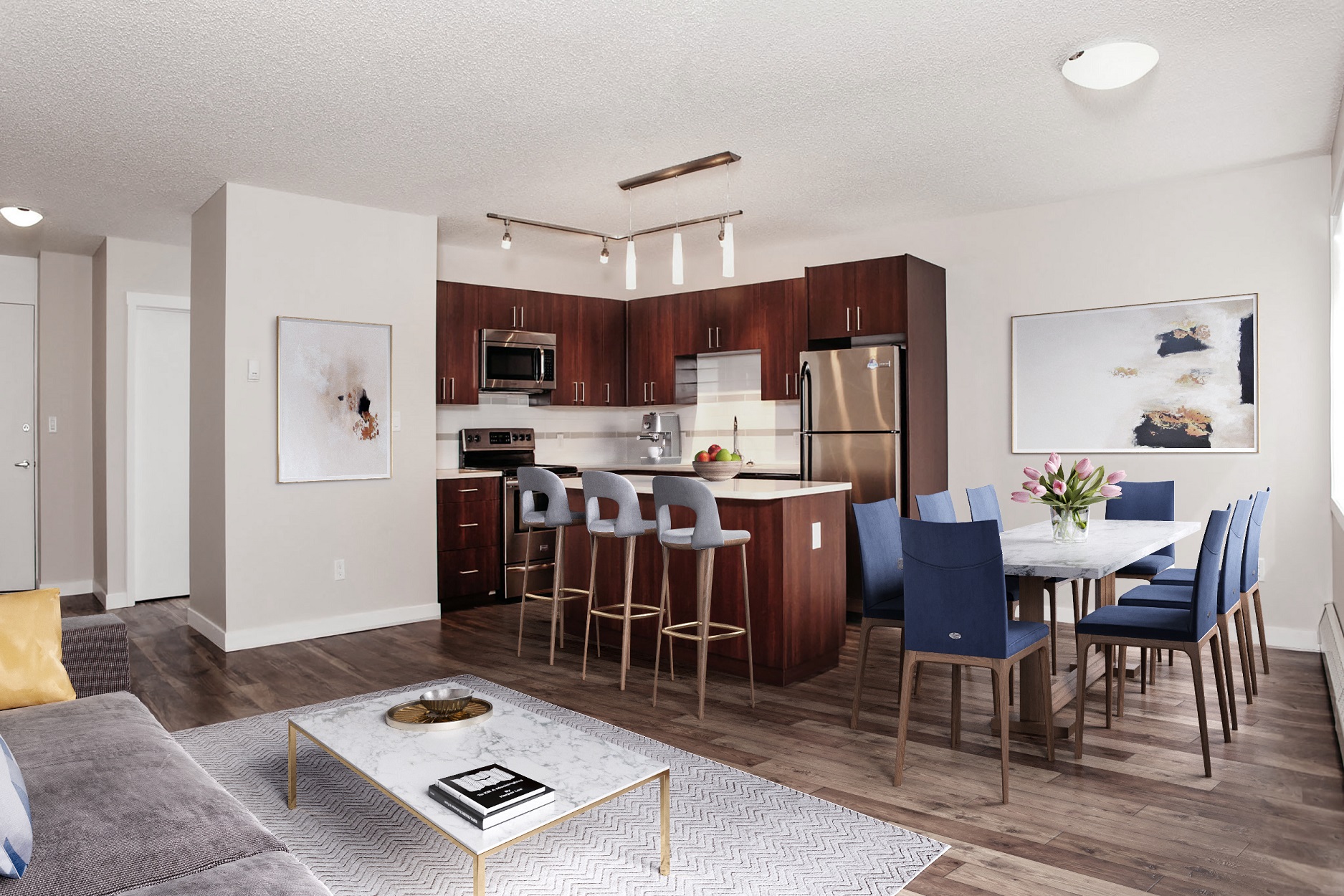 kitchen and dining are with a dining room table, bar stools and an island.