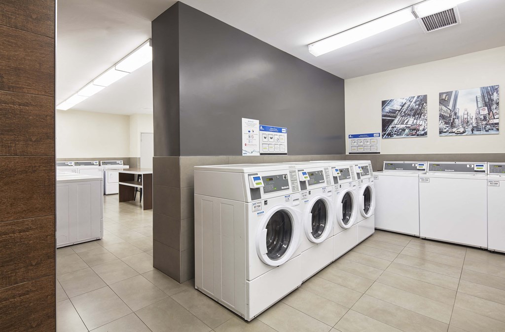 On-site laundry facilities with numerous washers and dryers