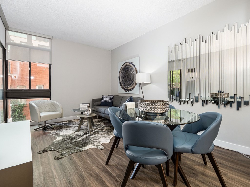 Living and dining space in renovated unit at 57 Charles