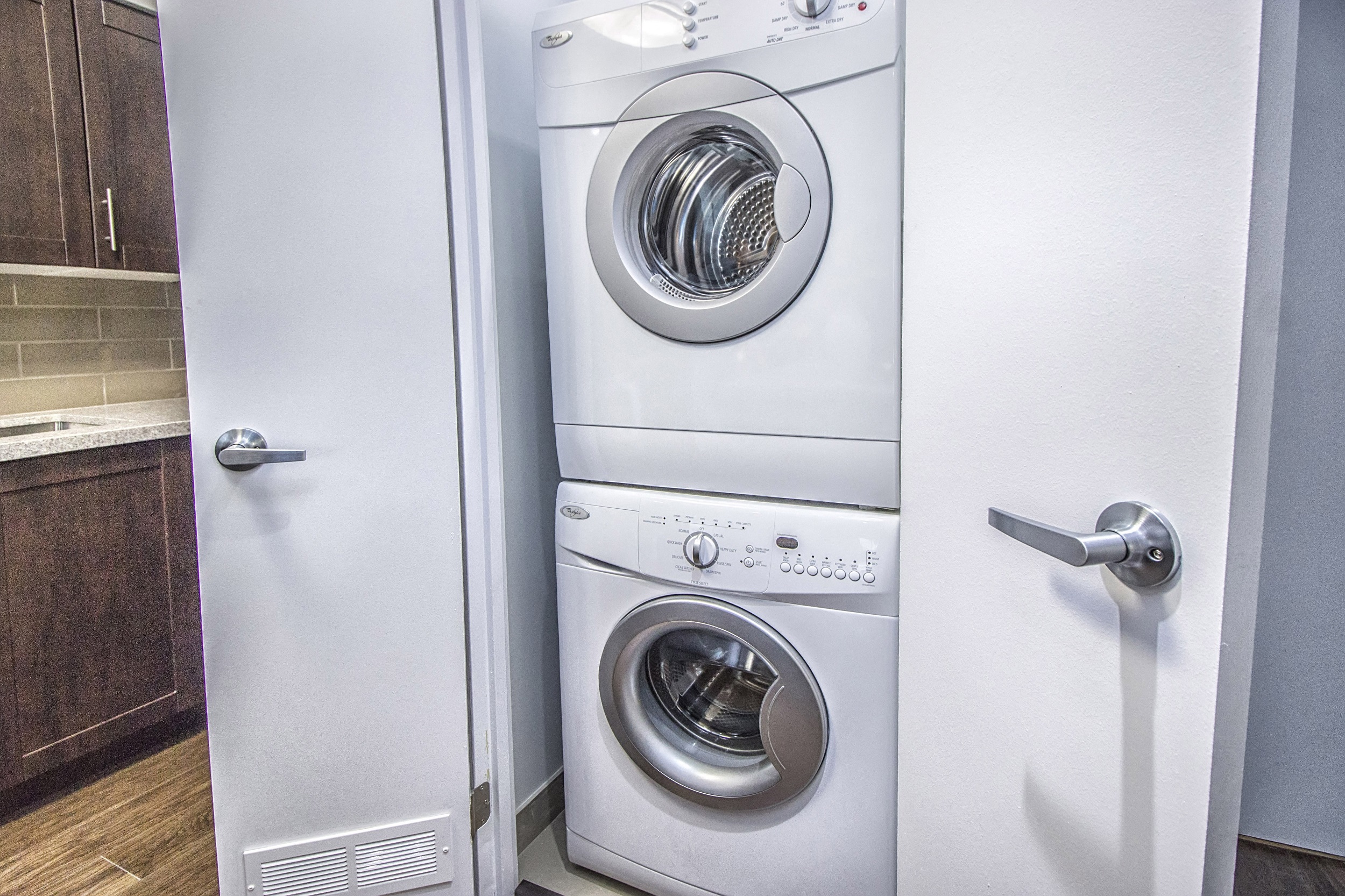In-suite stacked washer and dryer