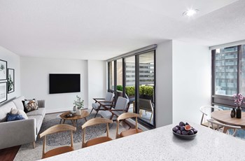 Living and dining area in upgraded unit at 57 Charles - Photo Gallery 3