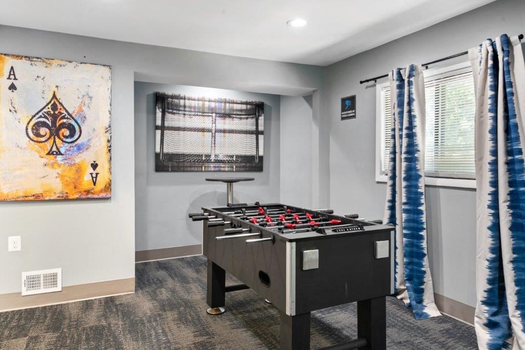 play a game of air hockey in our games room