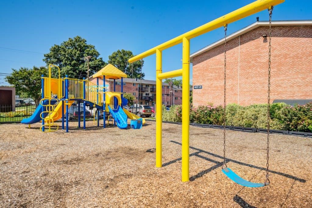 our playground is in front of our building and has a swing set